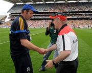 30 July 2011; Tyrone manager Mickey Harte shakes hands with Roscommon manager Fergal O'Donnell at the end of the game. GAA Football All-Ireland Senior Championship Qualifier, Round 4, Roscommon v Tyrone, Croke Park, Dublin. Picture credit: Oliver McVeigh / SPORTSFILE