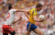 30 July 2011; Michael Finneran, Roscommon, in action against Colm Cavanagh, Tyrone. GAA Football All-Ireland Senior Championship Qualifier, Round 4, Roscommon v Tyrone, Croke Park, Dublin. Picture credit: Oliver McVeigh / SPORTSFILE