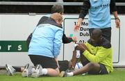 30 July 2011; Yaya Toure, Manchester City, is attended to by medical staff during squad training ahead of the second day of the Dublin Super Cup. University Training Grounds, UCD, Belfield, Dublin. Picture credit: Brendan Moran / SPORTSFILE