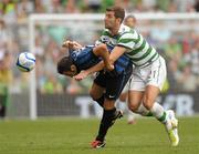 30 July 2011; Giampolo Pazzini, Inter Milan, in action against Charlie Mulgrew, Glasgow Celtic FC. Dublin Super Cup, Inter Milan v Glasgow Celtic FC, Aviva Stadium, Lansdowne Road, Dublin. Photo by Sportsfile