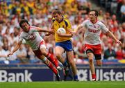 30 July 2011; Michael Finneran, Roscommon, in action against Joe McMahon, left, and Colm Cavanagh, Tyrone. GAA Football All-Ireland Senior Championship Qualifier, Round 4, Roscommon v Tyrone, Croke Park, Dublin. Picture credit: Dáire Brennan / SPORTSFILE