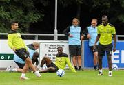 30 July 2011; New Manchester City signing Sergio Aguero, left, watched by manager Roberto Mancini, assistant coach David Platt and team-mate Mario Balotelli, during squad training ahead of the Dublin Super Cup. University Training Grounds, UCD, Belfield, Dublin. Picture credit: Brendan Moran / SPORTSFILE