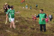 30 July 2011; Waterford manager Davy Fitzgerald, left, who represented Clare, and former World Boxing Champion Bernard Dunne during the Poc Fada na hÉireann. Annaverna Mountains, Dundalk, Co. Louth. Picture credit: Ray Lohan / SPORTSFILE