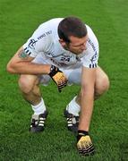 30 July 2011; A dejected Ronan Sweeney, Kildare, sits on the pitch after the game. GAA Football All-Ireland Senior Championship Quarter-Final, Donegal v Kildare, Croke Park, Dublin. Picture credit: Dáire Brennan / SPORTSFILE