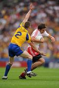 30 July 2011; Mark Donnelly, Tyrone, in action against Sean McDermott, Roscommon. GAA Football All-Ireland Senior Championship Qualifier, Round 4, Roscommon v Tyrone, Croke Park, Dublin. Picture credit: Ray McManus / SPORTSFILE
