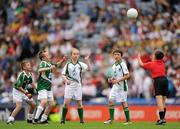30 July 2011; Matthew Kelly, left, and Matthew Rabette, Team 1, and Hannah Rabbette, left, and Cian McGrath, Team 2, compete for at the throw-in. Go Games Exhibition - Saturday 30 July, Croke Park, Dublin. Picture credit: Ray McManus / SPORTSFILE