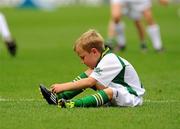 30 July 2011; Tommy Cunningham, Team 2, ties his laces during the game. Go Games Exhibition - Saturday 30 July, Croke Park, Dublin. Picture credit: Dáire Brennan / SPORTSFILE