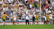 30 July 2011; A umpire croses the goal and point flags to indicate that a 'goal' for Kildare had been disallowed. GAA Football All-Ireland Senior Championship Quarter-Final, Donegal v Kildare, Croke Park, Dublin. Picture credit: Ray McManus / SPORTSFILE