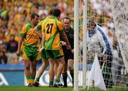 30 July 2011; Referee David Coldrick instructs an umpire to signal for a disallowed Kildare goal, as Donegal players remonstrate. GAA Football All-Ireland Senior Championship Quarter-Final, Donegal v Kildare, Croke Park, Dublin. Picture credit: Oliver McVeigh / SPORTSFILE