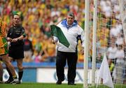 30 July 2011; The umpire picks up his flags to indicate a 'goal' for Kildare had been disallowed. GAA Football All-Ireland Senior Championship Quarter-Final, Donegal v Kildare, Croke Park, Dublin. Picture credit: Oliver McVeigh / SPORTSFILE