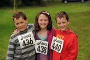 31 July 2011; Nine year old triplets, Evan, left, Sadbh and Rossa O'Brien, from Kilcock, Co Kildare, before the start of the Athletics Ireland Family Fitness Festival at Farmleigh. Phoenix Park, Dublin. Picture credit: Ray McManus / SPORTSFILE
