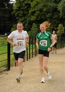 31 July 2011; Ireland's Kate Veale, Gold Medallist in the Girls 5000m Walk, with her dad James in action during Athletics Ireland Family Fitness Festival at Farmleigh. Phoenix Park, Dublin. Picture credit: Ray McManus / SPORTSFILE