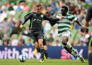 31 July 2011; Daniel Kearns, Airtricity League XI, in action against Victor Wanyama, Glasgow Celtic FC. Dublin Super Cup, Airtricity League XI v Glasgow Celtic FC, Aviva Stadium, Lansdowne Road, Dublin. Picture credit: Brendan Moran / SPORTSFILE