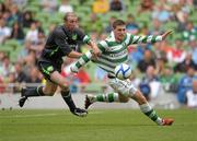 31 July 2011; Gary Hooper, Glasgow Celtic FC, in action against Owen Heary, Airtricity League XI. Dublin Super Cup, Airtricity League XI v Glasgow Celtic FC, Aviva Stadium, Lansdowne Road, Dublin. Photo by Sportsfile