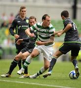 31 July 2011; Anthony Stokes, Glasgow Celtic FC, in action against Joe Gamble, left, and Daniel Lafferty, Airtricity League XI. Dublin Super Cup, Airtricity League XI v Glasgow Celtic FC, Aviva Stadium, Lansdowne Road, Dublin. Picture credit: Brendan Moran / SPORTSFILE
