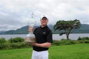31 July 2011; Simon Dyson with the Irish Open Trophy  after the final round of the 2011 Discover Ireland Irish Open Golf Championship, Killarney Golf & Fishing Club, Killarney, Co. Kerry. Picture credit: Matt Browne / SPORTSFILE