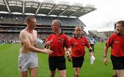 31 July 2011; Referee Pat McEnaney with Kerry's Tomás Ó Sé after the game. GAA Football All-Ireland Senior Championship Quarter-Final, Kerry v Limerick, Croke Park, Dublin. Picture credit: Diarmuid Greene / SPORTSFILE