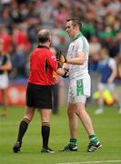 31 July 2011; Jim Donovan, Limerick, shakes hands with referee Pat McEnaney after the game. GAA Football All-Ireland Senior Championship Quarter-Final, Kerry v Limerick, Croke Park, Dublin. Picture credit: Ray McManus / SPORTSFILE