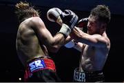 25 February 2017; Luke Keeler, right, in action against Lewis Taylor during their bout in the National Stadium in Dublin. Photo by Ramsey Cardy/Sportsfile