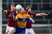 26 February 2017; Cathal O'Connor of Clare in action against Gary O'Donnell, left, and Paul Conroy of Galway during the Allianz Football League Division 2 Round 3 match between Galway and Clare at Pearse Stadium in Galway. Photo by Ramsey Cardy/Sportsfile