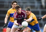 26 February 2017; Thomas Flynn of Galway is tackled by Gordon Kelly of Clare during the Allianz Football League Division 2 Round 3 match between Galway and Clare at Pearse Stadium in Galway. Photo by Ramsey Cardy/Sportsfile