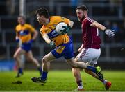 26 February 2017; Martin McMahon of Clare in action against Michael Lundy of Galway during the Allianz Football League Division 2 Round 3 match between Galway and Clare at Pearse Stadium in Galway. Photo by Ramsey Cardy/Sportsfile