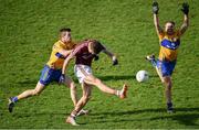 26 February 2017; Michael Daly of Galway in action against  Ciaran Russell, left, and Gordon Kelly of Clare during the Allianz Football League Division 2 Round 3 match between Galway and Clare at Pearse Stadium in Galway. Photo by Ramsey Cardy/Sportsfile