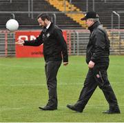 26 February 2017; A general view of match referee David Gough, left, and Tyrone GAA official Eugene McConnell inspect the pitch before the Allianz Football League Division 1 Round 3 match between Tyrone and Cavan which was posponed  because of a waterlogged pitch at Healy Park in Omagh, Co. Tyrone. Photo by Oliver McVeigh/Sportsfile
