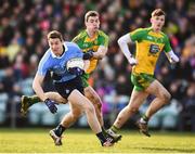 26 February 2017; Jason Whelan of Dublin in action against Caolan Ward of Donegal during the Allianz Football League Division 1 Round 3 match between Donegal and Dublin at MacCumhaill Park in Ballybofey, Co Donegal. Photo by Stephen McCarthy/Sportsfile