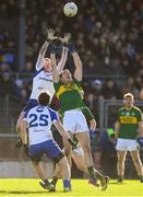 26 February 2017; Ryan McAnespie of Monaghan contests a high ball with Jack Barry of Kerry during the Allianz Football League Division 1 Round 3 match between Kerry and Monaghan at Fitzgerald Stadium in Killarney, Co. Kerry. Photo by Brendan Moran/Sportsfile