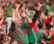 31 July 2011; Mayo supporters celebrate a score. GAA Football All-Ireland Senior Championship Quarter-Final, Mayo v Cork, Croke Park, Dublin. Picture credit: Ray McManus / SPORTSFILE
