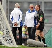 31 July 2011; Referee Rory Hickey consults with his umpires, at the Hill end, before issuing a yellow card to Mayo's Donal Vaughan. GAA Football All-Ireland Senior Championship Quarter-Final, Mayo v Cork, Croke Park, Dublin. Picture credit: Ray McManus / SPORTSFILE