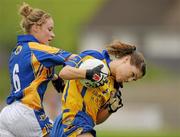 1 August 2011; Niamh Keane, Clare, in action against Samantha Lambert, Tipperary. TG4 Ladies Football Senior Championship – Round 1 Qualifier, Clare v Tipperary, Birr, Co. Offaly. Photo by Sportsfile