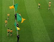 30 July 2011; Members of the Donegal team run out through flagbearers before the game. GAA Football All-Ireland Senior Championship Quarter-Final, Donegal v Kildare, Croke Park, Dublin. Picture credit: Ray McManus / SPORTSFILE