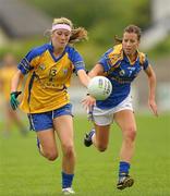 1 August 2011; Eimear Considine, Clare, in action against Barbara Ryan, Tipperary. TG4 Ladies Football Senior Championship – Round 1 Qualifier, Clare v Tipperary, Birr, Co. Offaly. Photo by Sportsfile