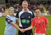 1 August 2011; Referee John Niland with Dublin captain Ellen Keatley and Cork captain Jess O'Shea before the start of the game. All Ireland Minor A Championship Final, Dublin v Cork, Birr, Co. Offaly. Photo by Sportsfile