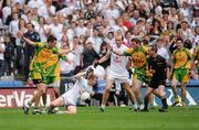 30 July 2011; Referee Davis Goldrick blows the whistle to indicate a free as Morgan O'Flaherty, Kildare, is fouled by Rory Kavanagh, Donegal, in the last minute of normal time. GAA Football All-Ireland Senior Championship Quarter-Final, Donegal v Kildare, Croke Park, Dublin. Picture credit: Ray McManus / SPORTSFILE