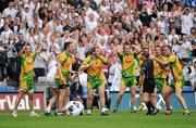 30 July 2011; Donegal players react as referee Davis Goldrick blows the whistle to indicate a free after Morgan O'Flaherty, 6, Kildare, was fouled by Rory Kavanagh, Donegal, in the last minute of normal time. GAA Football All-Ireland Senior Championship Quarter-Final, Donegal v Kildare, Croke Park, Dublin. Picture credit: Ray McManus / SPORTSFILE