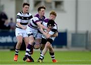 27 February 2017; Eimhin O’Neill of Belvedere College is tackled by David Wilkinson, left, and Barry Dooley of Clongowes Wood College during the Bank of Ireland Leinster Schools Junior Cup second round match between Belvedere College and Clongowes Wood College at Donnybrook Stadium in Donnybrook, Dublin. Photo by Piaras Ó Mídheach/Sportsfile