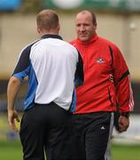 1 August 2011; Cork manager Brian Cuthbert shakes hands with Dublin manager Dessie Farrell after the match. GAA Football All-Ireland Minor Championship Quarter-Final, Dublin v Cork, O'Moore Park, Portlaoise, Co. Laois. Picture credit: Stephen McCarthy / SPORTSFILE