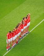 31 July 2011; The Cork team stand together for the National Anthem. GAA Football All-Ireland Senior Championship Quarter-Final, Mayo v Cork, Croke Park, Dublin. Picture credit: Dáire Brennan / SPORTSFILE