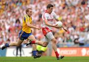 30 July 2011; Sean Cavanagh, Tyrone, in action against Donal Ward, Roscommon. GAA Football All-Ireland Senior Championship Qualifier, Round 4, Roscommon v Tyrone, Croke Park, Dublin. Picture credit: Oliver McVeigh / SPORTSFILE