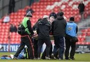 1 March 2017; Eathan Greene of Bandon Grammar is removed from the pitch on a strecher by medical staff after sustaining a head injury during the Clayton Hotels Munster Schools Senior Cup Semi-Final match between Presentation College Cork and Bandon Grammar at Irish Independent Park in Cork. Photo by Eóin Noonan/Sportsfile