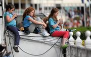 4 August 2011; Young ladies watch on during the Power & Speed Event. Dublin Horse Show 2011, RDS, Ballsbridge, Dublin. Picture credit: Brian Lawless / SPORTSFILE