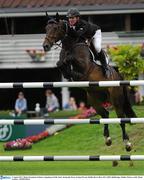 4 August 2011; Shane Sweetnam, Ireland, competing on Little Emir, during the Power & Speed Event. Dublin Horse Show 2011, RDS, Ballsbridge, Dublin. Picture credit: Brian Lawless / SPORTSFILE