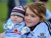5 August 2011; Dublin supporters Ellie May Gowran, age 4, with her brother Jack Jerry Gowran, age 7 weeks, from Kilmainham, Dublin, during an open training session ahead of their side's GAA Hurling All-Ireland Senior Championship Semi-Final match against Tipperary, on August 14th. Dublin Hurling Squad Press Evening, Parnell Park, Dublin. Picture credit: Stephen McCarthy / SPORTSFILE