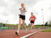 6 August 2011; Kate Veale, from West Waterford AC, races clear of Laura Reybolds, Mohill AC, on her way to winning the Women's 5000m Walking event at the Woodie's DIY AAI Senior Track & Field Championships. Morton Stadium, Santry, Co. Dublin. Picture credit: Pat Murphy / SPORTSFILE