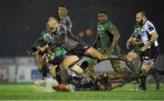 3 March 2017; Kieran Marmion of Connacht is tackled by Lloyd Greeff and Dion Berryman of Zebre during the Guinness PRO12 Round 17 match between Connacht and Zebre at the Sportsground in Galway. Photo by Matt Browne/Sportsfile