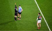 4 March 2017; Philip McMahon of Dublin is shown a yellow card by referee David Coldrick as Cillian O'Connor of Mayo looks on during the Allianz Football League Division 1 Round 4 match between Dublin and Mayo at Croke Park in Dublin. Photo by Ray McManus/Sportsfile