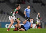 4 March 2017; Philip McMahon of Dublin holds his face after a clash with Cillian O'Connor of Mayo during the Allianz Football League Division 1 Round 4 match between Dublin and Mayo at Croke Park in Dublin. Photo by Brendan Moran/Sportsfile